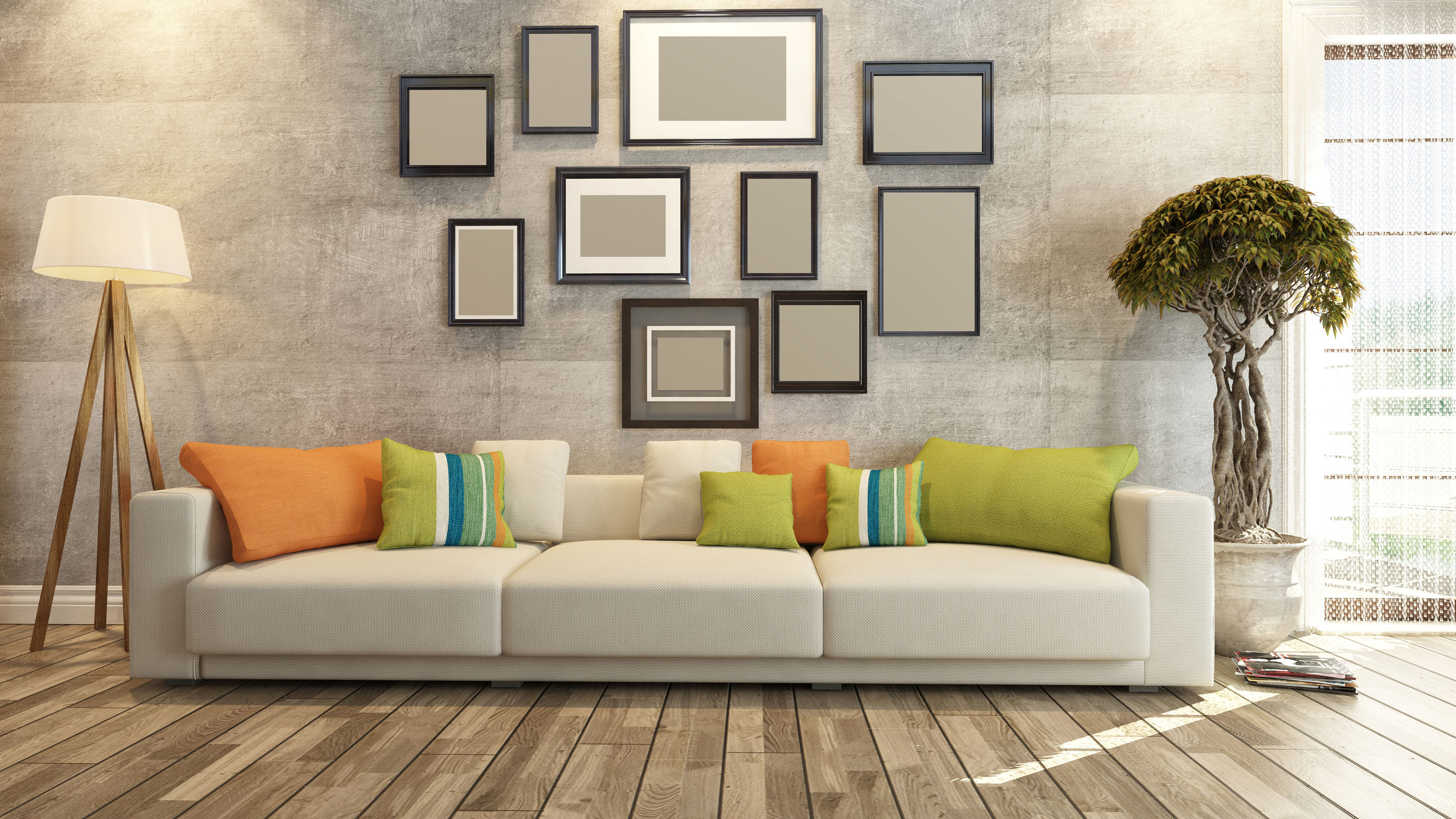 Bild mit einem Sofa vor einer Wand stehend auf einem Dielenfußboden